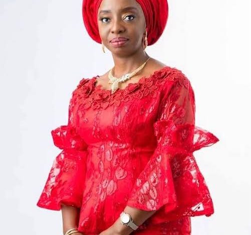 Sanwo-Olu wearing a red attire