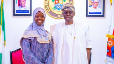 Governor Sanwo-Olu in a post with LASU Best Graduating student, Aminat